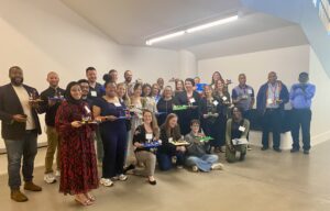 May 2025 Course Design Institute participants showcase their LEGO models, which symbolize their course design visions.